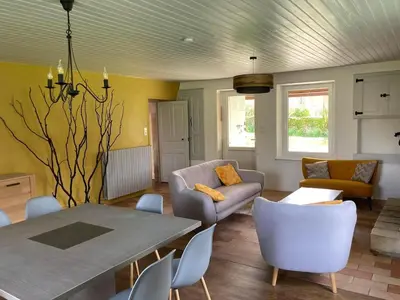 Coin salon dans l'établissement La maison du plessis