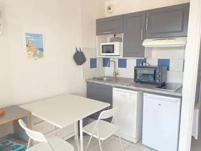 Cuisine ou kitchenette dans l'établissement Paisible cocon proche plage - piscine - parking