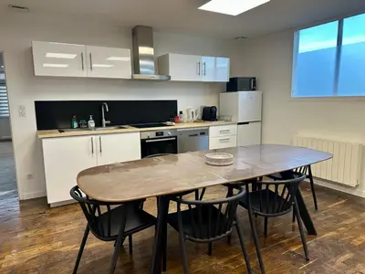 Cuisine ou kitchenette dans l'établissement Le Lido Maison 6 personnes