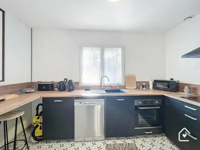 Cuisine ou kitchenette dans l'établissement La Dinière - Calme - Jardin - 15mn du Futuroscope
