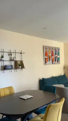 Coin salon dans l'établissement Appartement sur la plage