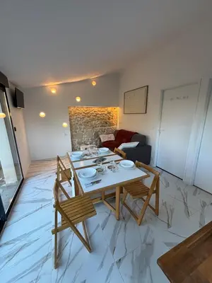 Coin salon dans l'établissement La Suite du Maine SAINTES