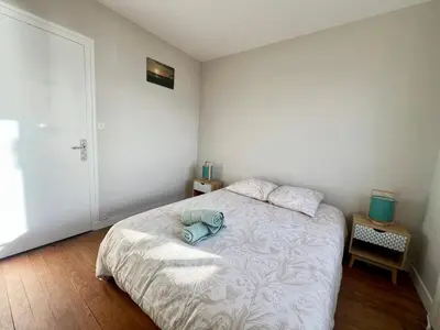 Un ou plusieurs lits dans un hébergement de l'établissement Maison face à mer Châtelaillon-Plage - Vue sur la mer - Parking GRATUIT