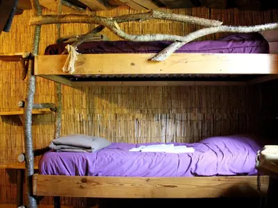 Un ou plusieurs lits dans un hébergement de l'établissement Maison avec Terrasse - 3 Chambres pour 8 Personnes - API-1-52-1337