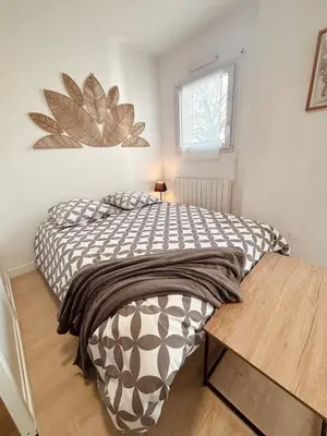 Un ou plusieurs lits dans un hébergement de l'établissement Charming new studio