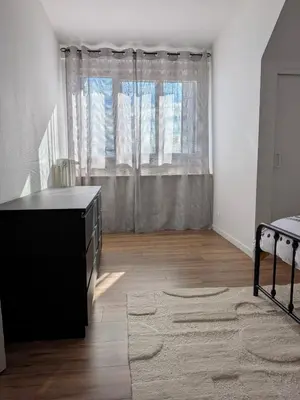 Un ou plusieurs lits dans un hébergement de l'établissement Maison cosy 3 chambres - Quartier des Dunes