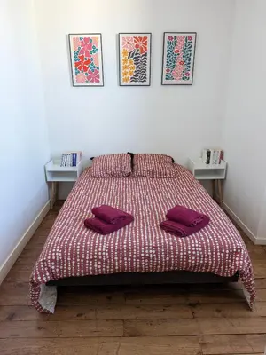 Un ou plusieurs lits dans un hébergement de l'établissement Maison cosy 3 chambres - Quartier des Dunes