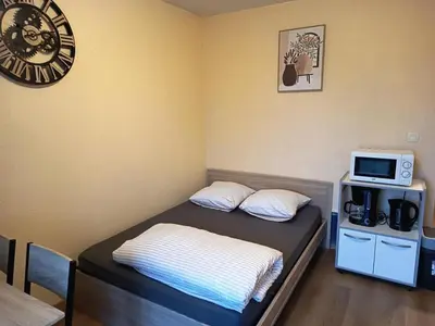 Un ou plusieurs lits dans un hébergement de l'établissement Studio T1 NIORT proche MAIF et Pôle Universitaire