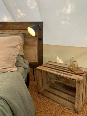 Un ou plusieurs lits dans un hébergement de l'établissement Glamping Moulin de Saza
