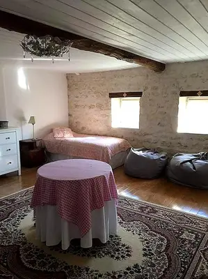 Un ou plusieurs lits dans un hébergement de l'établissement Mortafond-L'Échappée Douce, Charming Rural Retreat