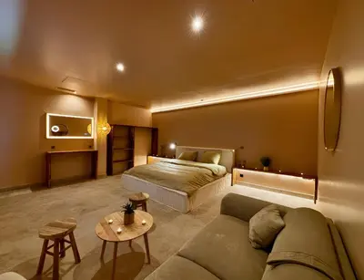Un ou plusieurs lits dans un hébergement de l'établissement ExSPArience Private Spa Suite