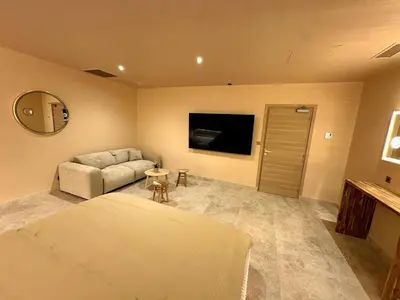 Télévision ou salle de divertissement dans l'établissement ExSPArience Private Spa Suite