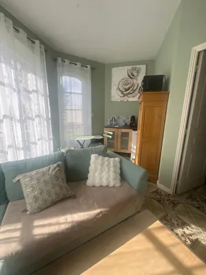 Coin salon dans l'établissement Maison en pierre
