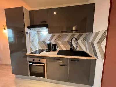 Cuisine ou kitchenette dans l'établissement Studio 127 à 8 min à pied du Futuroscope 1 à 4 pers