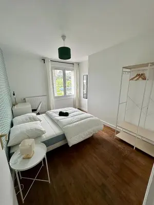 Un ou plusieurs lits dans un hébergement de l'établissement Appartement confort Gare et Centre à pied 4 pers