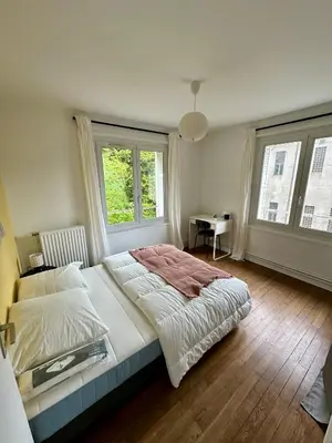 Un ou plusieurs lits dans un hébergement de l'établissement Appartement confort Gare et Centre à pied 4 pers