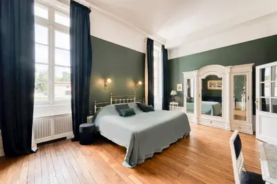 Un ou plusieurs lits dans un hébergement de l'établissement Château Optical Center