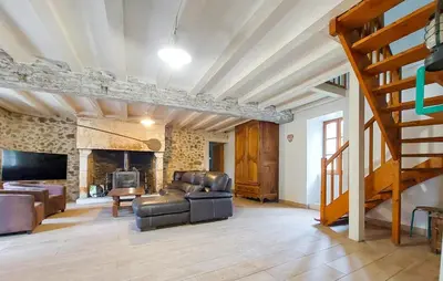 Coin salon dans l'établissement Charmante Maison Au Calme