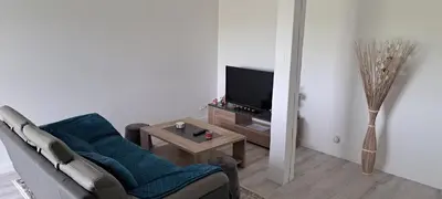 Télévision ou salle de divertissement dans l'établissement Gîte du Chemin vert