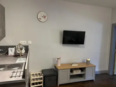 Cuisine ou kitchenette dans l'établissement Chabanais town centre Apartment Rose