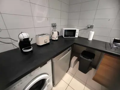 Cuisine ou kitchenette dans l'établissement L'Escale Bleue charme au Marais Poitevin