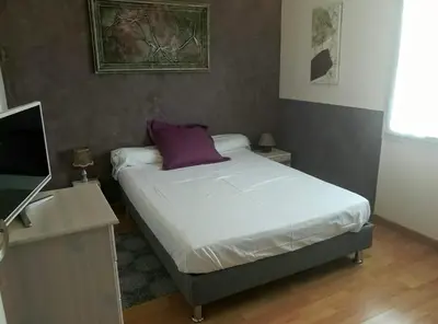 Un ou plusieurs lits dans un hébergement de l'établissement B&B La Difference