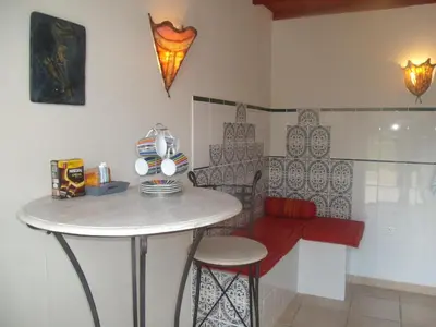 Coin salon dans l'établissement Le Clos des Palmiers