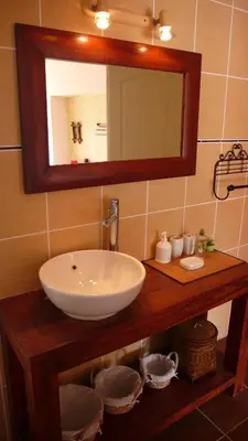 Salle de bains dans l'établissement Le Clos des Palmiers