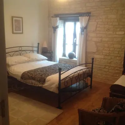 Un ou plusieurs lits dans un hébergement de l'établissement Le Grenier 1 Rue Verte Tusson 16140 France