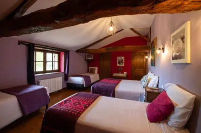 Un ou plusieurs lits dans un hébergement de l'établissement Chambres d'hôtes du puy d'anché