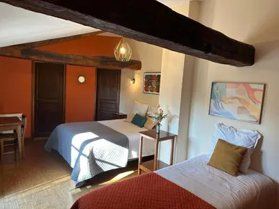 Un ou plusieurs lits dans un hébergement de l'établissement Chambres d'hôtes du puy d'anché