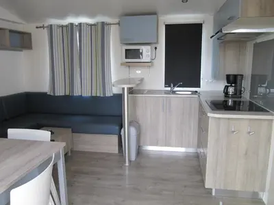 Cuisine ou kitchenette dans l'établissement Camping du Mouchet