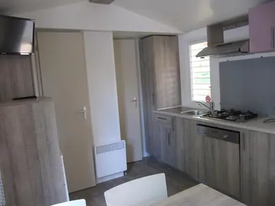 Cuisine ou kitchenette dans l'établissement Camping du Mouchet