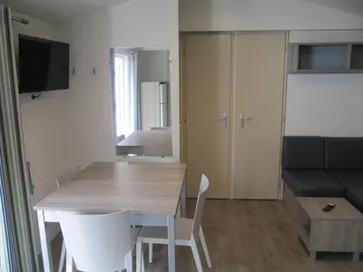 Télévision ou salle de divertissement dans l'établissement Camping du Mouchet
