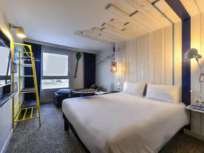 Un ou plusieurs lits dans un hébergement de l'établissement ibis styles La Rochelle Thalasso Chatelaillon