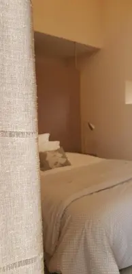 Un ou plusieurs lits dans un hébergement de l'établissement Les Hauts De Chalonne