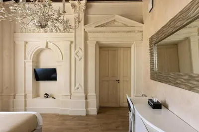 Télévision ou salle de divertissement dans l'établissement Château Pellisson