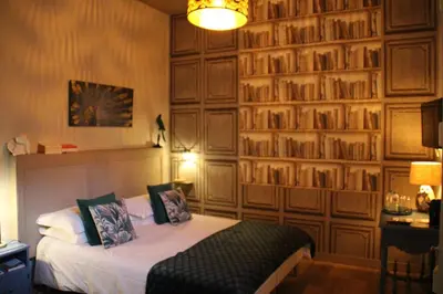 Un ou plusieurs lits dans un hébergement de l'établissement Une Chambre en Ville