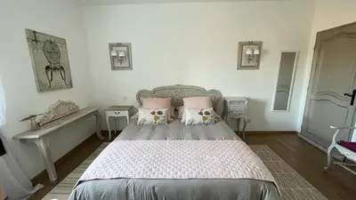 Un ou plusieurs lits dans un hébergement de l'établissement TENDANCE CAMPAGNE Chambre d'hôtes
