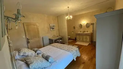 Un ou plusieurs lits dans un hébergement de l'établissement TENDANCE CAMPAGNE Chambre d'hôtes