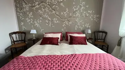 Un ou plusieurs lits dans un hébergement de l'établissement TENDANCE CAMPAGNE Chambre d'hôtes