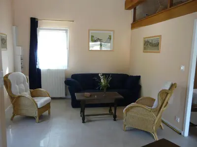 Coin salon dans l'établissement Gîte Des Vergnes