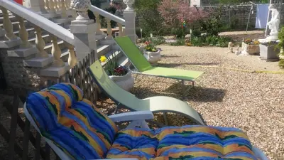 Jardin de l'établissement Chambre d'Hôtes Les Orchidées FUTUROSCOPE CHASSENEUIL POITIERS