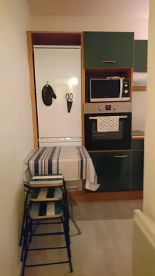 Cuisine ou kitchenette dans l'établissement Sur Le Vieux Port Appartement Vue Sur Mer