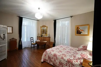 Un ou plusieurs lits dans un hébergement de l'établissement Château de Champblanc