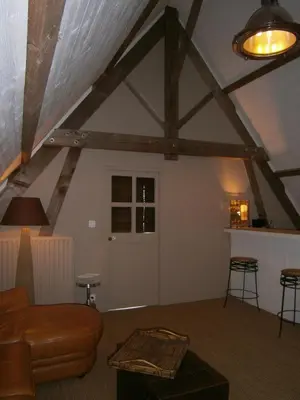 Coin salon dans l'établissement Le Relais du Haras