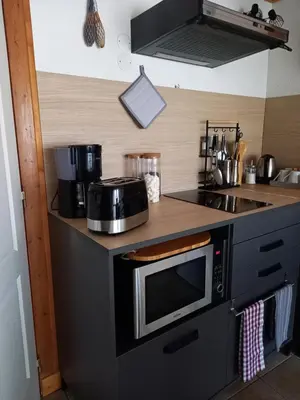 Cuisine ou kitchenette dans l'établissement La charentaise ch d'hôtes ,Studio