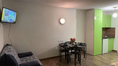 Télévision ou salle de divertissement dans l'établissement Appartement Futuroscope-P'