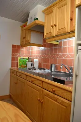 Cuisine ou kitchenette dans l'établissement Le Petit Massigny