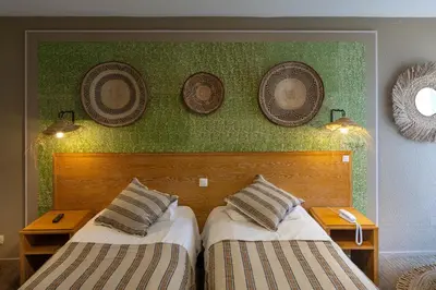 Un ou plusieurs lits dans un hébergement de l'établissement Garrigae Manoir de Beauvoir Poitiers Sud - Hotel & Spa